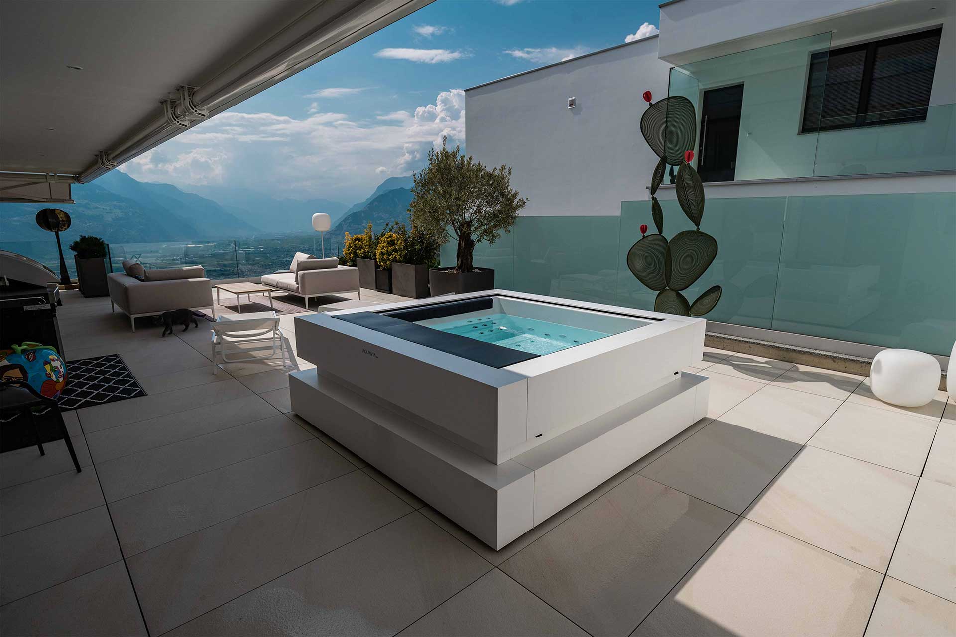 Aquavia rigid outdoor hot tub in an idyllic setting